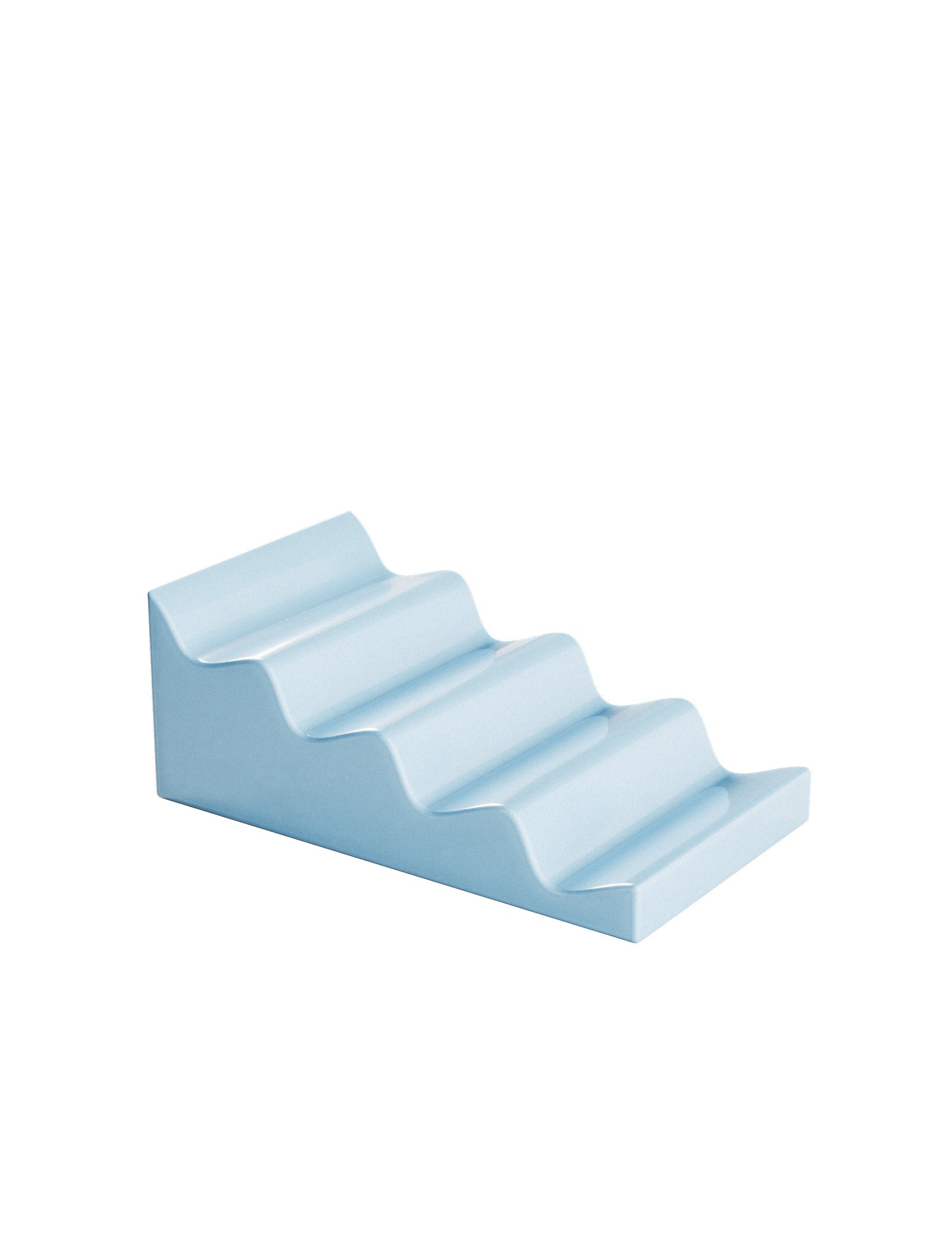 CASCADE Fruit Stand in light blue ceramic with stepped design for displaying apples, pears, and other fruits.