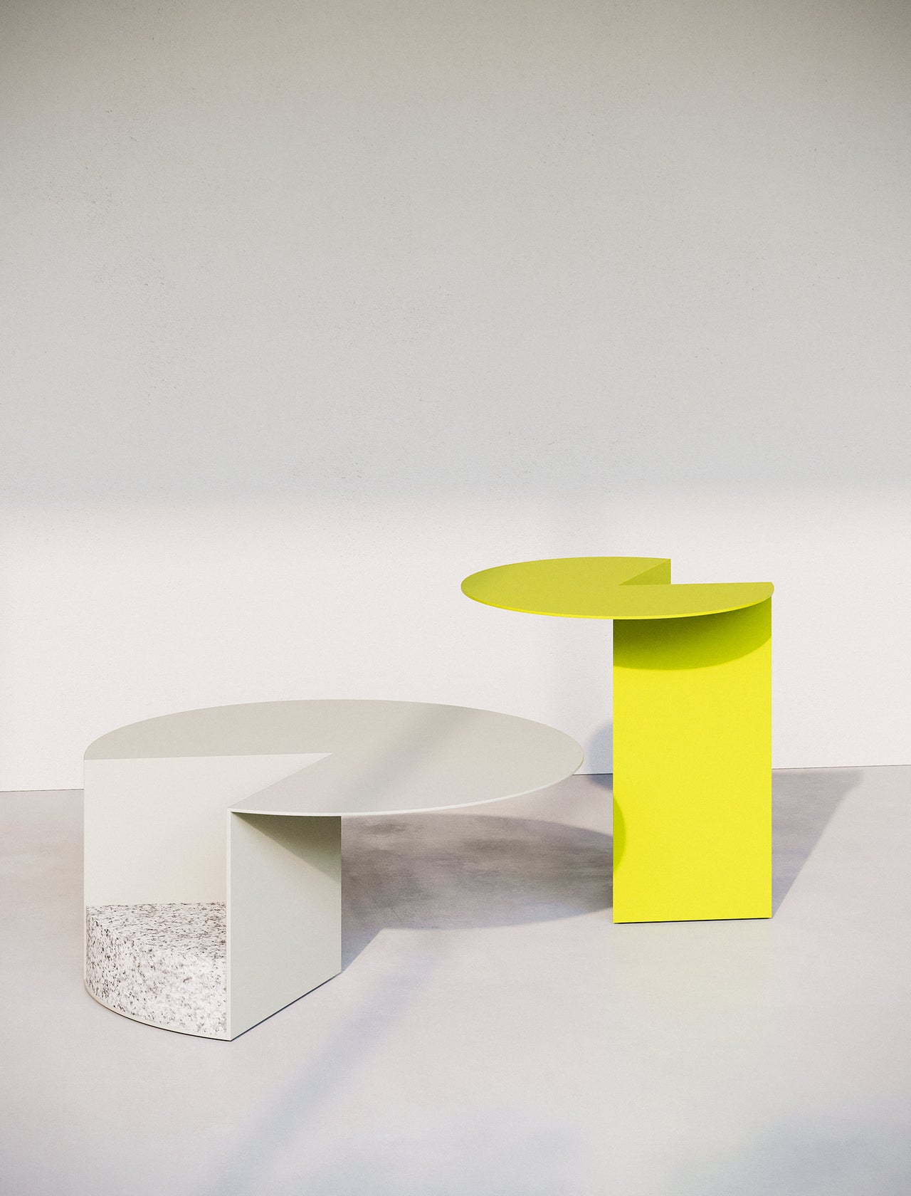 PAC Side Table 450 with round Pac-Man inspired aluminum top and solid granite base in contrasting colors.