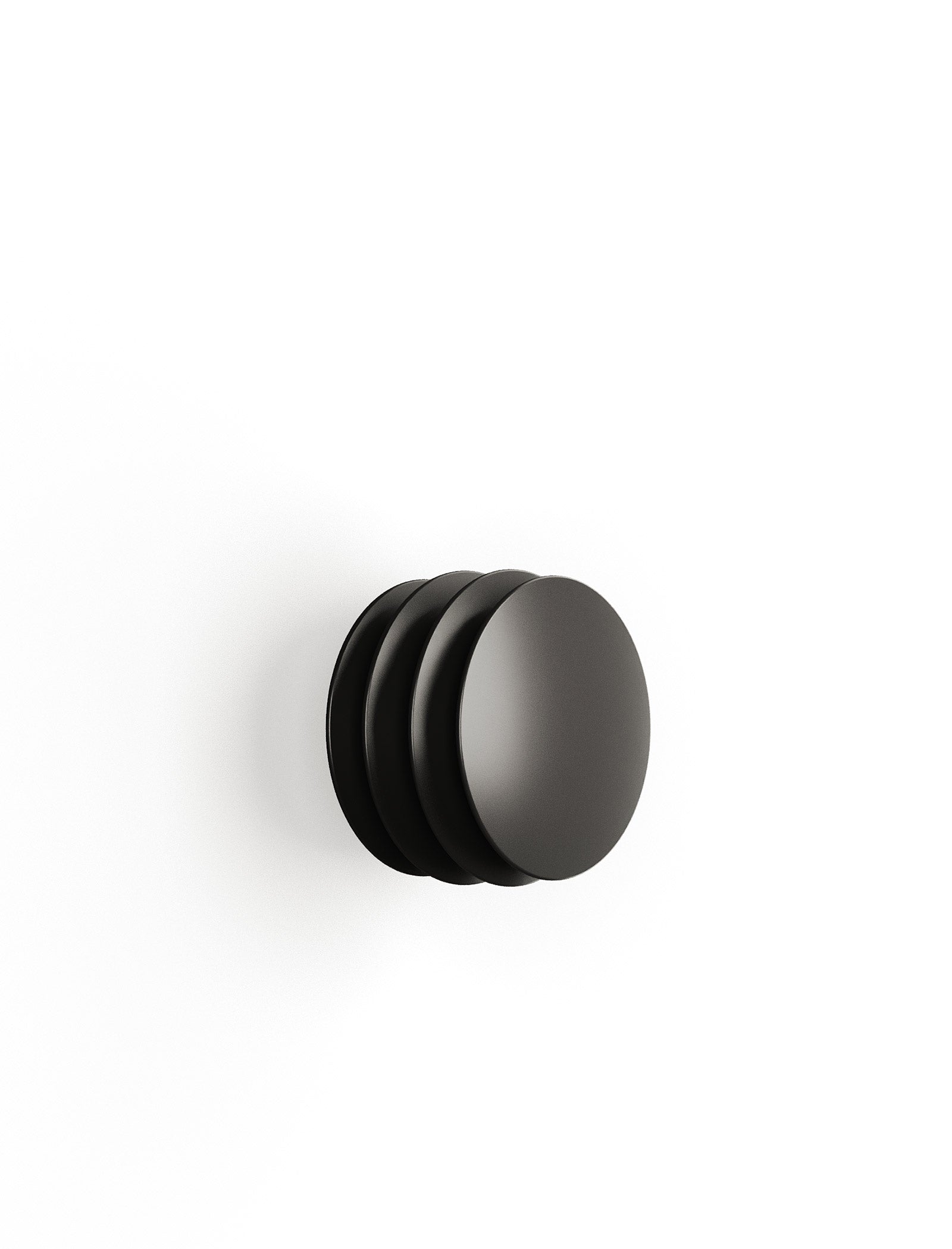 ACCORDION Hook - M2 minimalist black wall hook with accordion-style grooves for hanging jackets and bags.