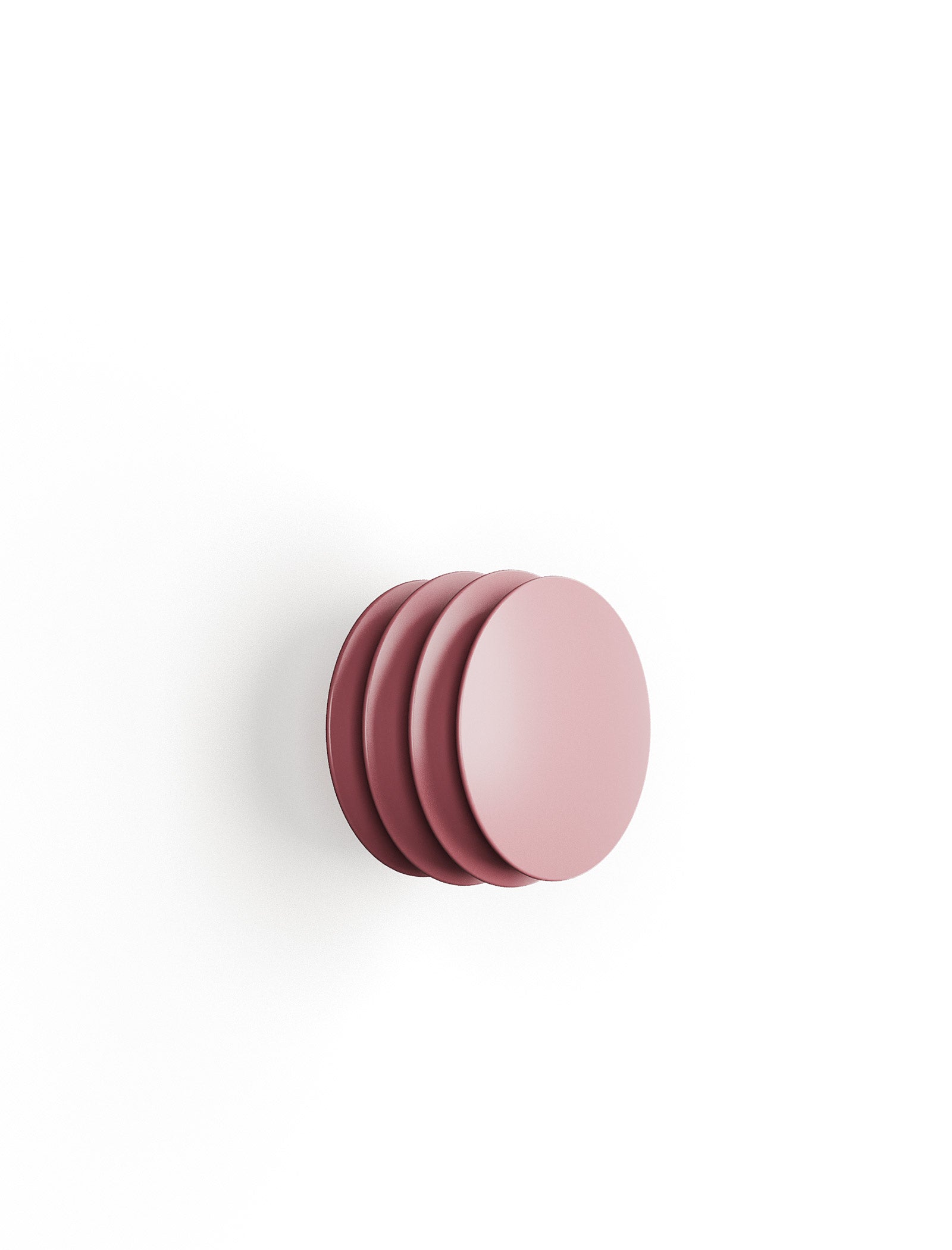 ACCORDION Hook - M2 in soft pink with a round, accordion-style design for hanging jackets and bags.