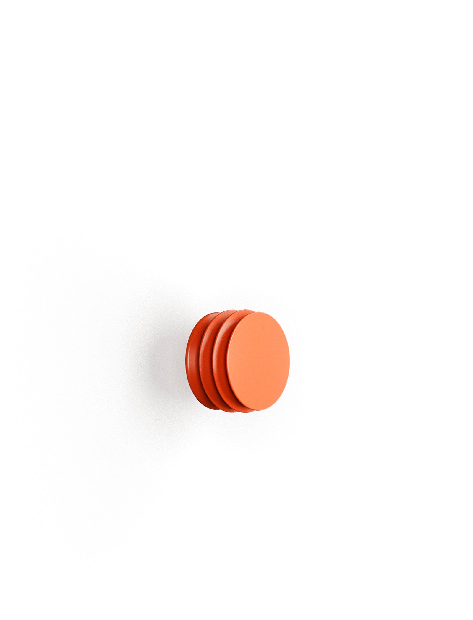 ACCORDION Hook - S1 in orange with accordion-style ridges, a functional and sculptural wall hook for coats and bags.